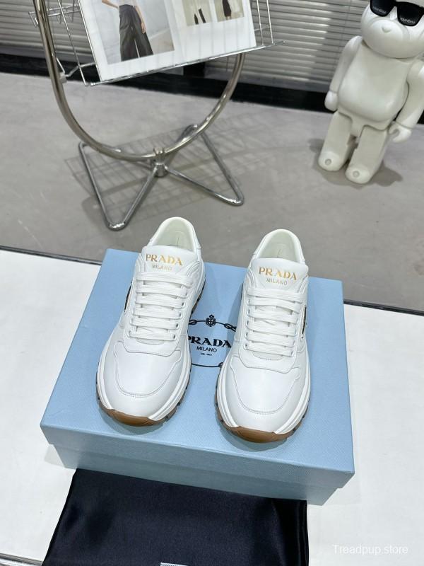 2025 Women Prada White Cow Leather Lambskin Sneakers KFY00310